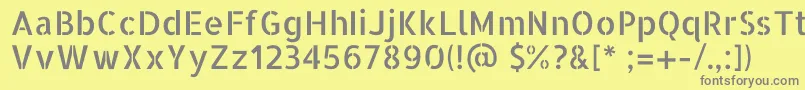 AllertastencilRegular-fontti – harmaat kirjasimet keltaisella taustalla