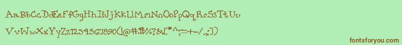 PrettyCityKitties Font – Brown Fonts on Green Background