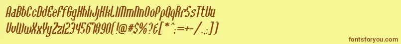 フォントBaccusbevelItalic – 茶色の文字が黄色の背景にあります。