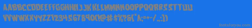 Vorvolakarotate-Schriftart – Graue Schriften auf blauem Hintergrund