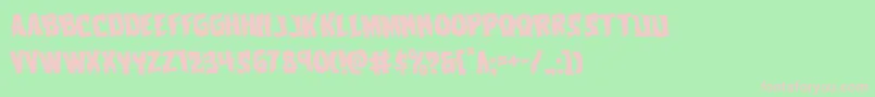 Vorvolakarotate-Schriftart – Rosa Schriften auf grünem Hintergrund