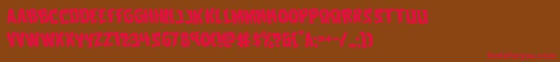 Vorvolakarotate-Schriftart – Rote Schriften auf braunem Hintergrund
