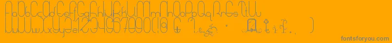 ASweetMelodyMyLady-Schriftart – Graue Schriften auf orangefarbenem Hintergrund