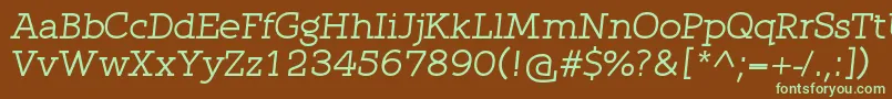 QlarendonItalic-fontti – vihreät fontit ruskealla taustalla