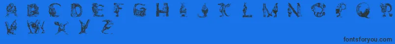 Czcionka ElfabetDecorative – czarne czcionki na niebieskim tle