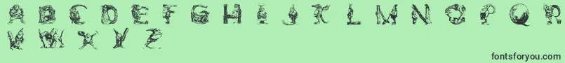 Więcej informacji o czcionce ElfabetDecorative Czcionka ElfabetDecorative – czarne czcionki na zielonym tle