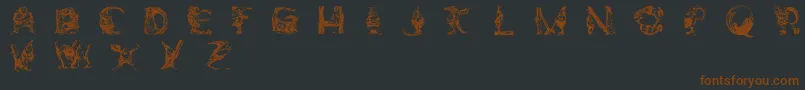 フォントElfabetDecorative – 黒い背景に茶色のフォント
