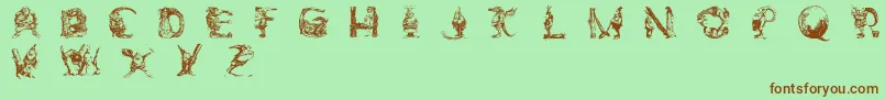 Czcionka ElfabetDecorative – brązowe czcionki na zielonym tle