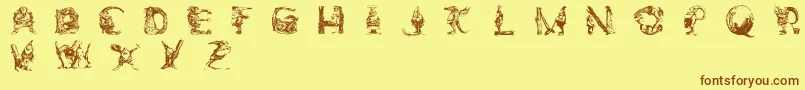 ElfabetDecorativeフォントについての詳細 フォントElfabetDecorative – 茶色の文字が黄色の背景にあります。