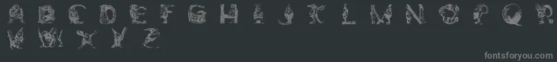 Weitere Informationen zur ElfabetDecorative-Schriftart ElfabetDecorative-Schriftart – Graue Schriften auf schwarzem Hintergrund