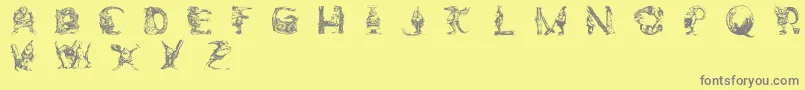 ElfabetDecorative-Schriftart – Graue Schriften auf gelbem Hintergrund