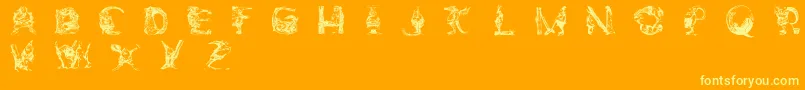 フォントElfabetDecorative – オレンジの背景に黄色の文字
