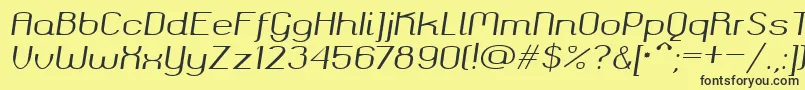 Fonte Okolaks Regular Italic – fontes pretas em um fundo amarelo