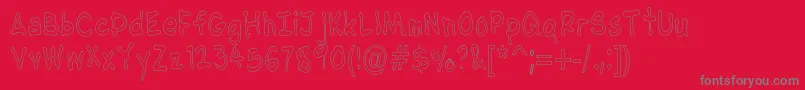 NipcensHandwritingCondout Font – Gray Fonts on Red Background