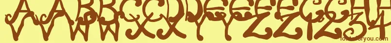 CreepyScrawly Font – Brown Fonts on Yellow Background