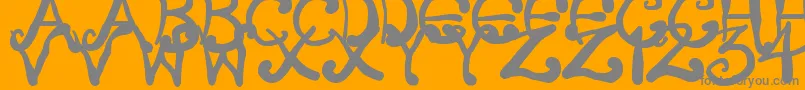 フォントCreepyScrawly – オレンジの背景に灰色の文字