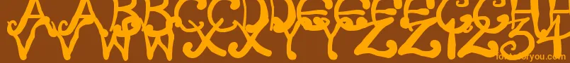 CreepyScrawly Font – Orange Fonts on Brown Background