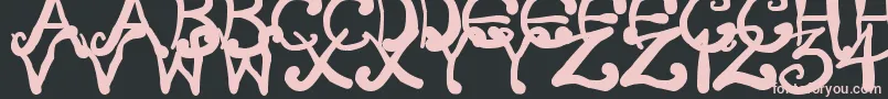 Czcionka CreepyScrawly – różowe czcionki na czarnym tle