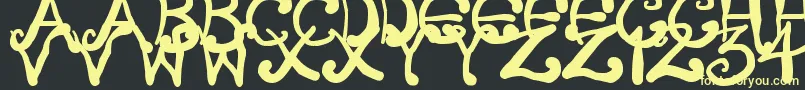 CreepyScrawly Font – Yellow Fonts on Black Background