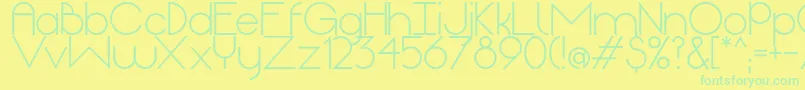OriginRegular-Schriftart – Grüne Schriften auf gelbem Hintergrund