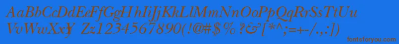 QuibbernItalic-Schriftart – Braune Schriften auf blauem Hintergrund