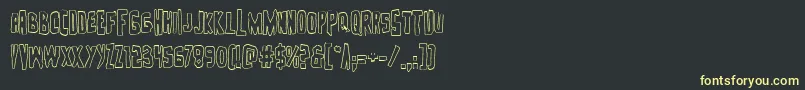 フォントZakensteinout – 黒い背景に黄色の文字