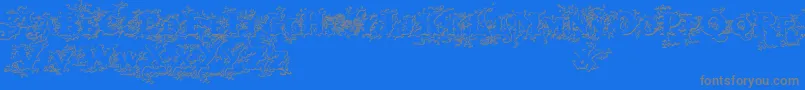Darkwoodbeveled Font – Gray Fonts on Blue Background