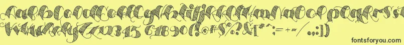 フォントEspesorolas2 – 黒い文字の黄色い背景