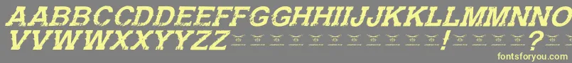 Шрифт GunfighteracademyItalic – жёлтые шрифты на сером фоне