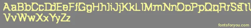 BackToBay6-Schriftart – Gelbe Schriften auf grauem Hintergrund