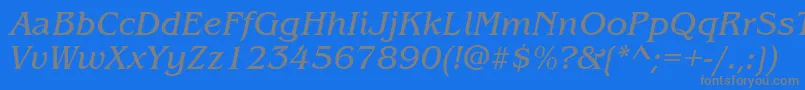 ItcBenguiatBookItalic-Schriftart – Graue Schriften auf blauem Hintergrund