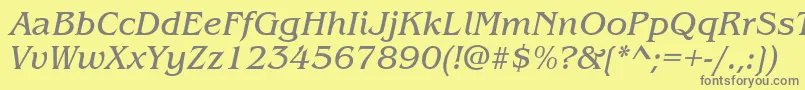 フォントItcBenguiatBookItalic – 黄色の背景に灰色の文字