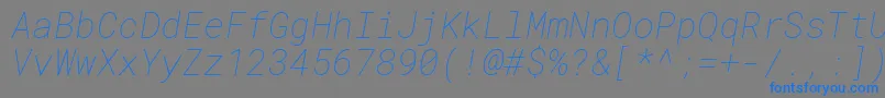 Czcionka RobotomonoThinitalic – niebieskie czcionki na szarym tle