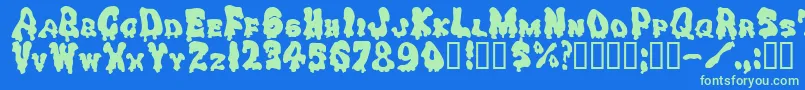 Drippinggoo Font – Green Fonts on Blue Background