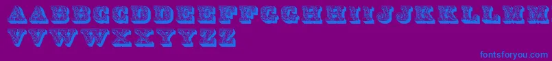 フォントDslettres – 紫色の背景に青い文字