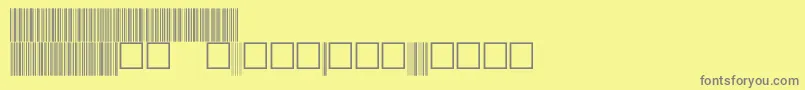 V100029-fontti – harmaat kirjasimet keltaisella taustalla