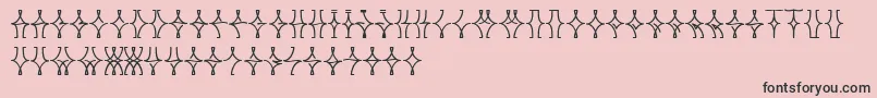 フォントNellyfrdNormal – ピンクの背景に黒い文字