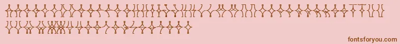 Шрифт NellyfrdNormal – коричневые шрифты на розовом фоне