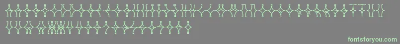 フォントNellyfrdNormal – 灰色の背景に緑のフォント