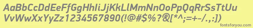PfdindisplayproBolditalic-fontti – harmaat kirjasimet keltaisella taustalla