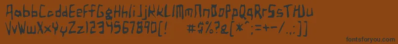 フォントBirdlandAeroplane – 黒い文字が茶色の背景にあります