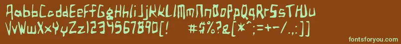 フォントBirdlandAeroplane – 緑色の文字が茶色の背景にあります。