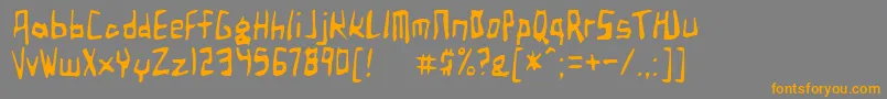 フォントBirdlandAeroplane – オレンジの文字は灰色の背景にあります。