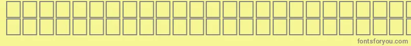フォントAlBsher – 黄色の背景に灰色の文字