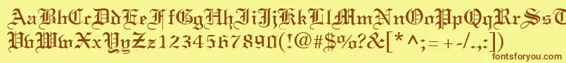 フォントLinustextRegular – 茶色の文字が黄色の背景にあります。