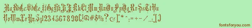 VictorianGothicOne-Schriftart – Braune Schriften auf grünem Hintergrund