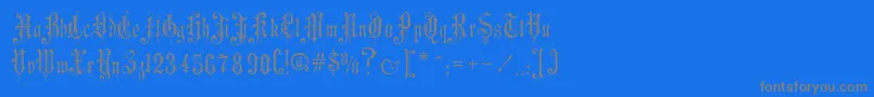 VictorianGothicOne-Schriftart – Graue Schriften auf blauem Hintergrund