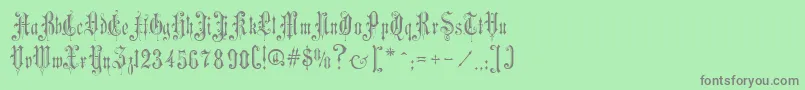 フォントVictorianGothicOne – 緑の背景に灰色の文字