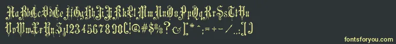 フォントVictorianGothicOne – 黒い背景に黄色の文字