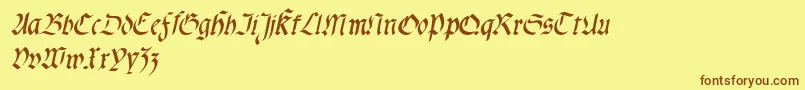 フォントFractasemibolditalic – 茶色の文字が黄色の背景にあります。